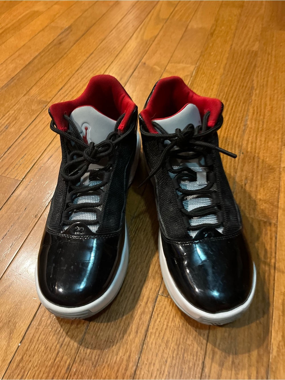 Nike Black and Red Mid-Top Sneakers